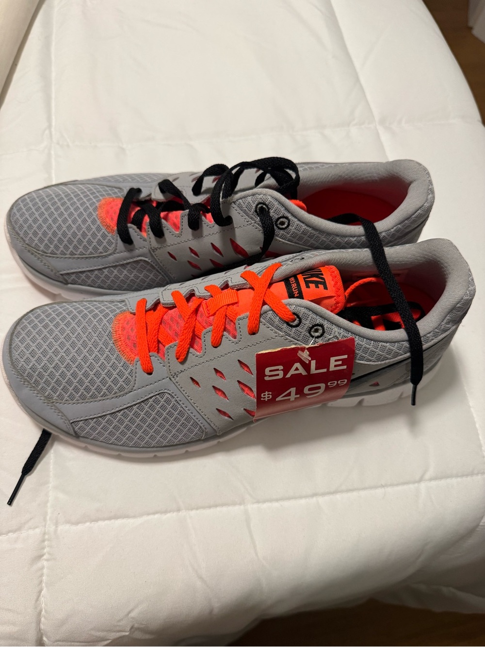 Nike Men’s Gray Athletic Shoes with Bright Orange Accents